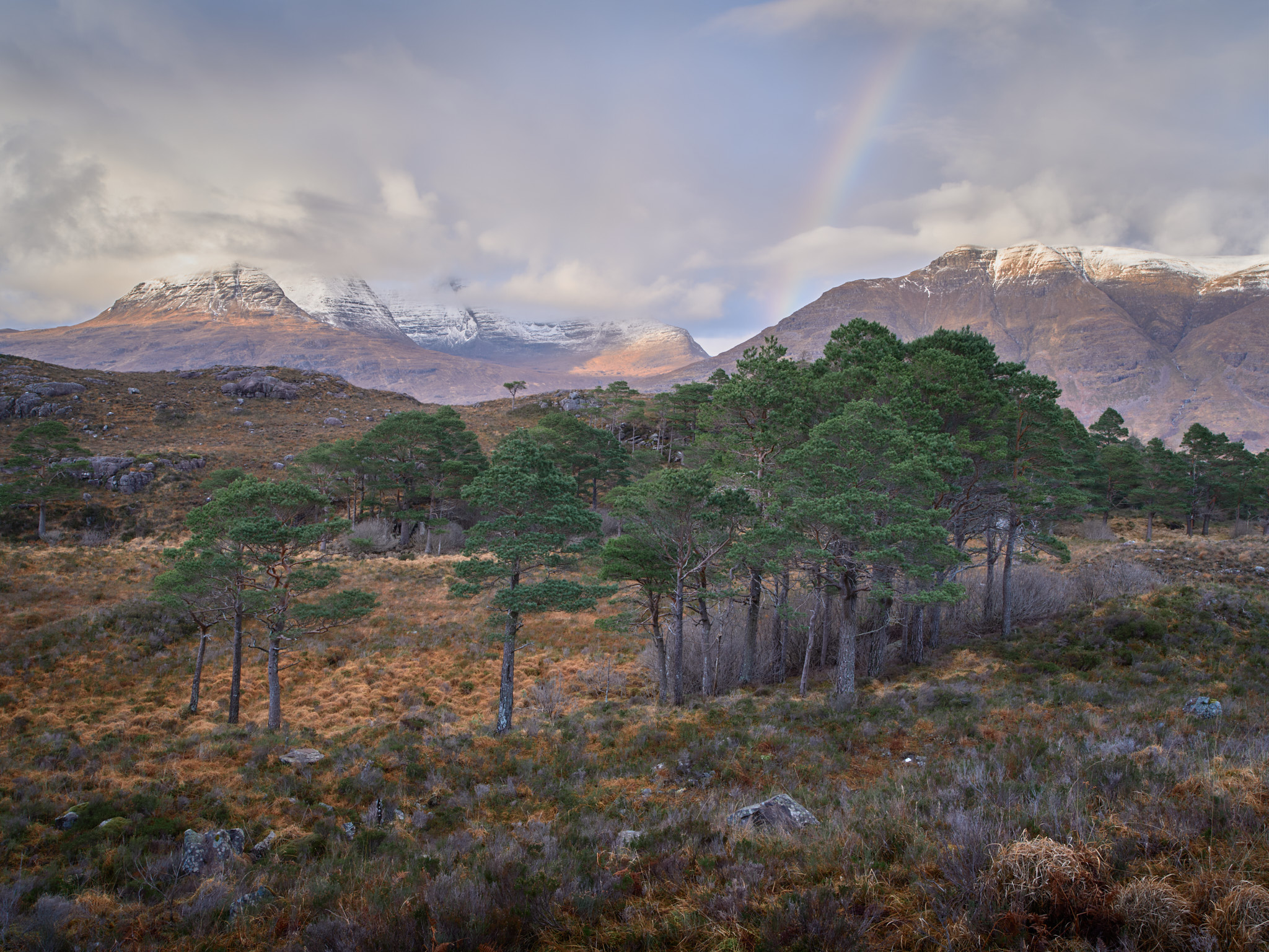 Torridon mountains with a unicorn - sorry, rainbow - behind